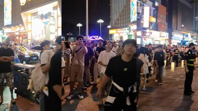 长沙五一广场国庆跳楼惊魂！男子坐在边沿楼顶 楼下无数人围观 现场目击视频流出！